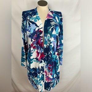 Lovely pull over with blues and pinks. Chico size. 3X 73% cotton, 27% nylon